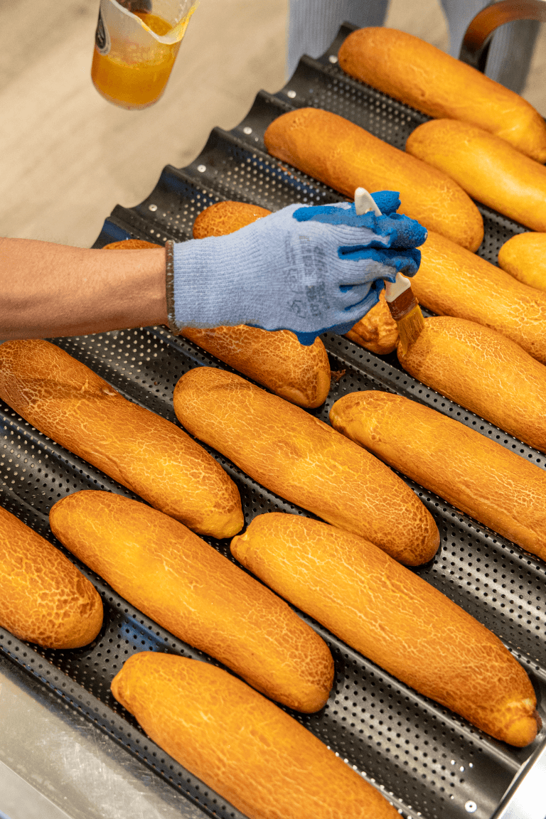 Fresh baguettes being baked at Long Bánh Mì